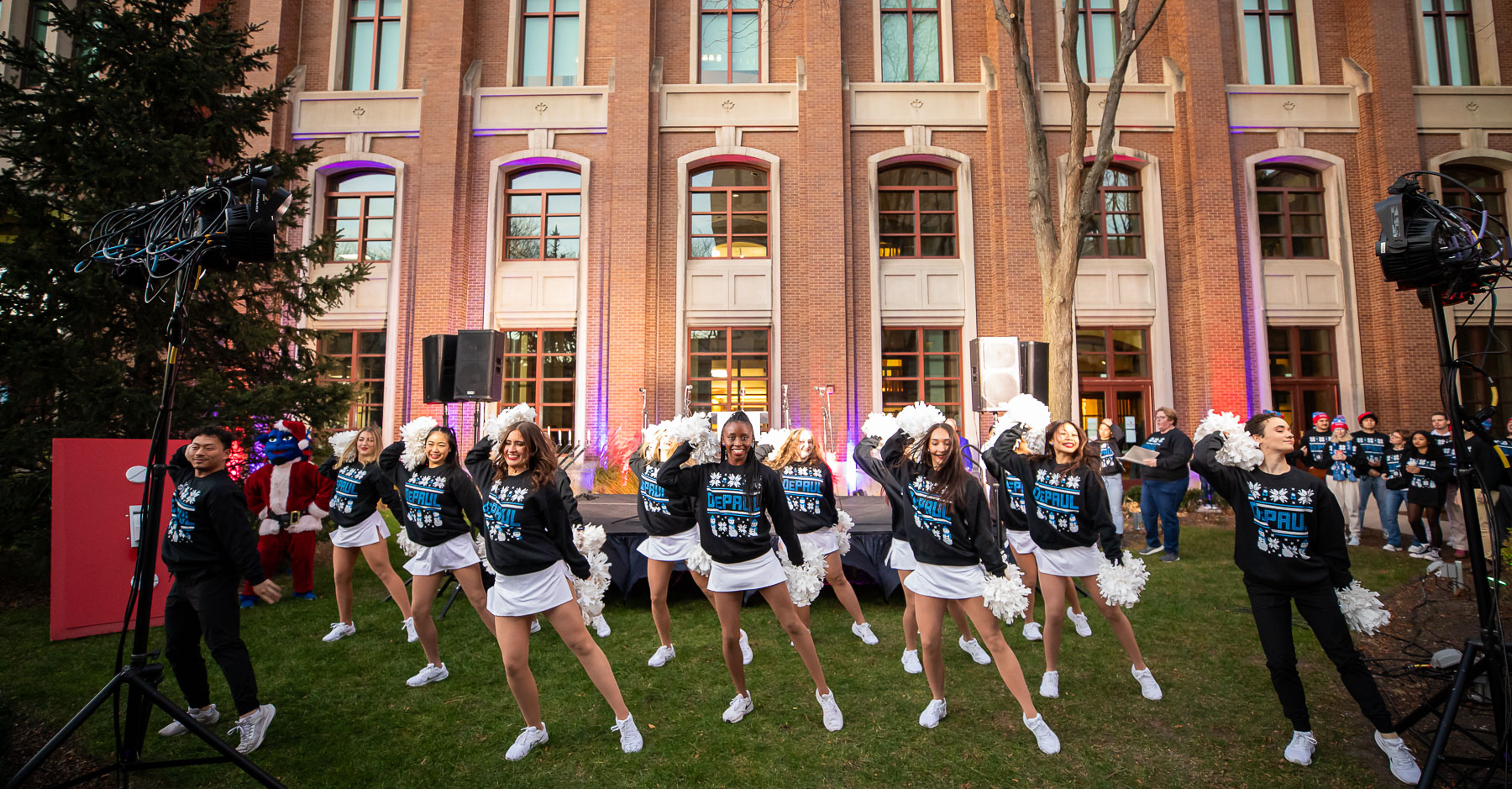 DePaul's dance squad entertained guests with a holiday-themed routine. (Photo by Jeff Carrion / DePaul University) 